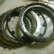 Underneath the 2-4 clutch piston, we find some friction & steel plates...